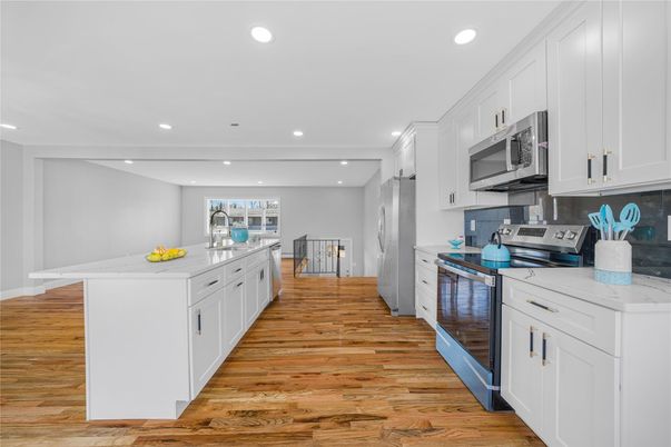 Interior, Kitchen, Recessed Lighting, Stainless Steel Appliances, Wood Texture Flooring