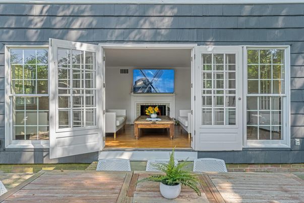 Exterior, Fireplace, Wood Texture Flooring
