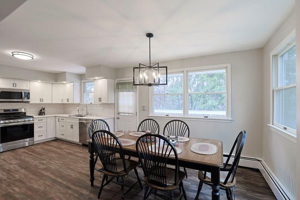 Dining room, Interior, Kitchen, Pendant Lights, Stainless Steel Appliances, Wood Texture Flooring