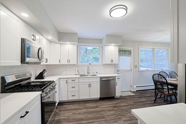 Dining room, Interior, Kitchen, Recessed Lighting, Stainless Steel Appliances, Wood Texture Flooring