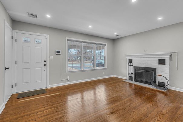 Empty room, Fireplace, Interior, Recessed Lighting, Wood Texture Flooring