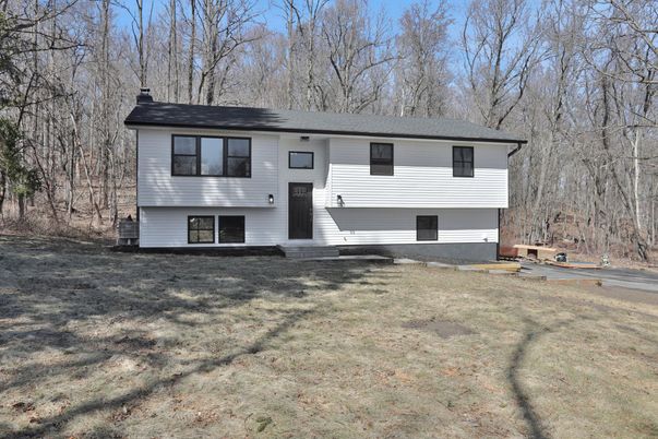 Attached, Exterior, Facade, Raised Ranch