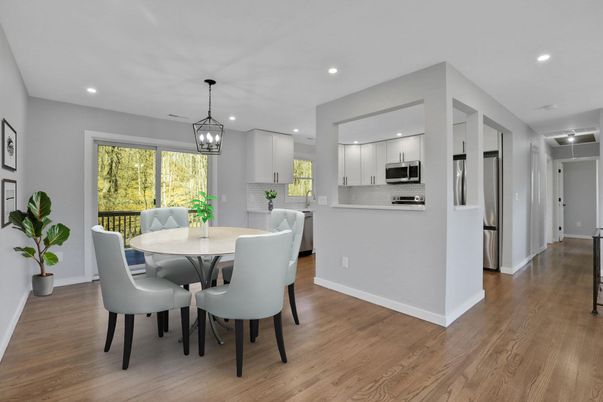 Dining room, Interior, Kitchen, Pendant Lights, Recessed Lighting, Stainless Steel Appliances, Wood Texture Flooring