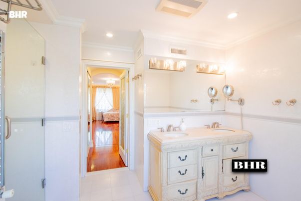 Bathroom, Dual Sink Vanities, Interior, Recessed Lighting, Wood Texture Flooring