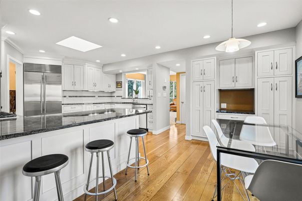 Dining room, Interior, Kitchen, Pendant Lights, Recessed Lighting, Stainless Steel Appliances, Wood Texture Flooring