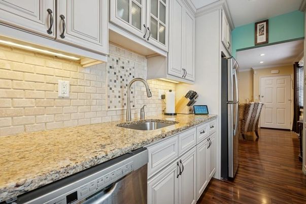 Interior, Kitchen, Recessed Lighting, Stainless Steel Appliances, Stone Walls, Wood Texture Flooring