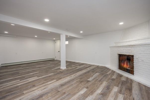 Empty room, Fireplace, Interior, Recessed Lighting, Wood Texture Flooring