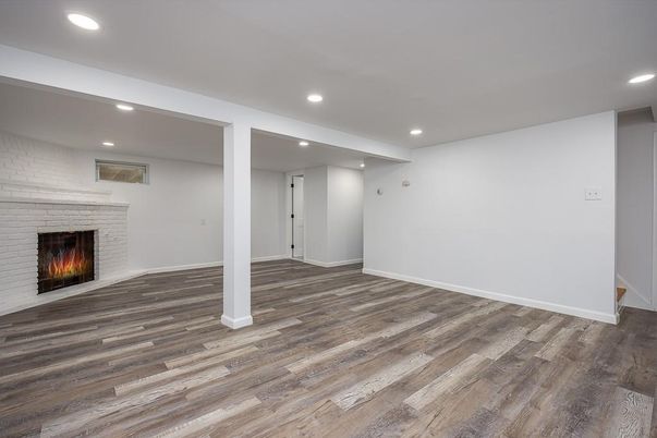 Empty room, Fireplace, Interior, Recessed Lighting, Wood Texture Flooring