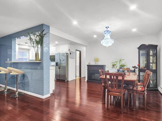 Chandelier, Dining room, Fireplace, Interior, Kitchen, Recessed Lighting, Wood Texture Flooring