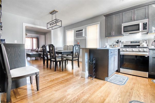 Dining room, Interior, Kitchen, Pendant Lights, Stainless Steel Appliances, Wood Texture Flooring