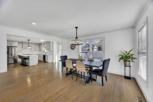 Chandelier, Dining room, Interior, Kitchen, Pendant Lights, Recessed Lighting, Stainless Steel Appliances, Wood Texture Flooring
