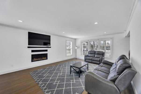 Fireplace, Interior, Living room, Recessed Lighting, Wood Texture Flooring