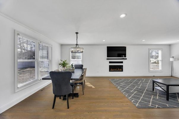 Chandelier, Dining room, Fireplace, Interior, Recessed Lighting, Wood Texture Flooring