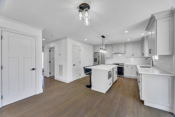 Interior, Kitchen, Pendant Lights, Recessed Lighting, Stainless Steel Appliances, Wood Texture Flooring