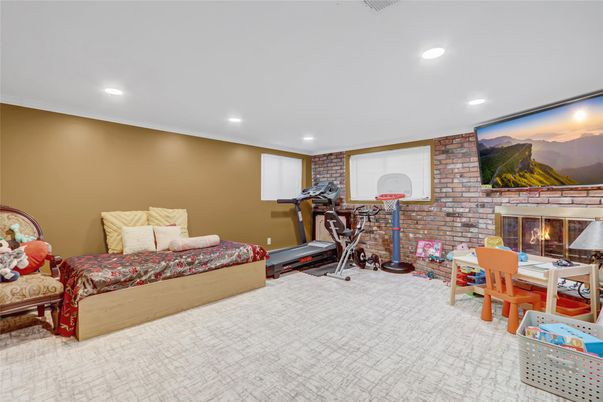 Bedroom, Fireplace, Fitness Equipment, Interior, Recessed Lighting, Stone Walls