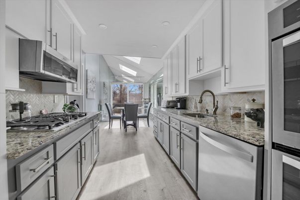 Dining room, Interior, Kitchen, Recessed Lighting, Stainless Steel Appliances, Wood Texture Flooring