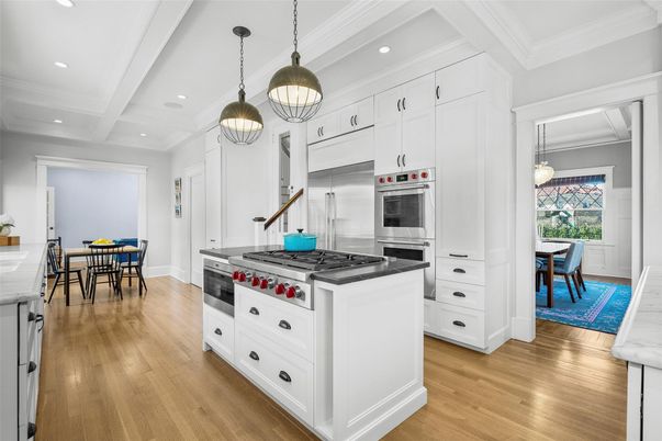 Dining room, Interior, Kitchen, Pendant Lights, Recessed Lighting, Stainless Steel Appliances, Wood Texture Flooring