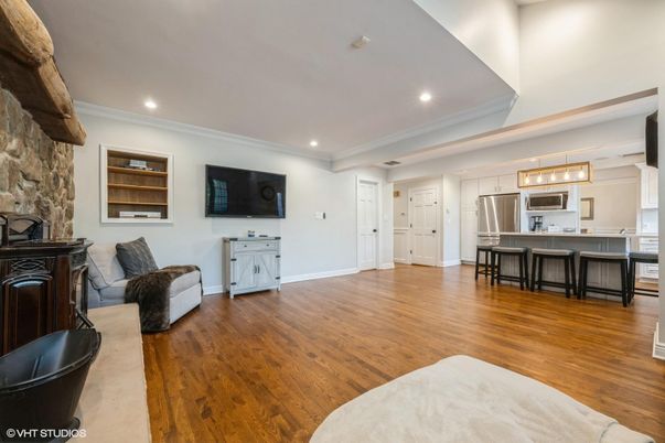 Interior, Kitchen, Recessed Lighting, Stainless Steel Appliances, Stone Walls, Wood Texture Flooring