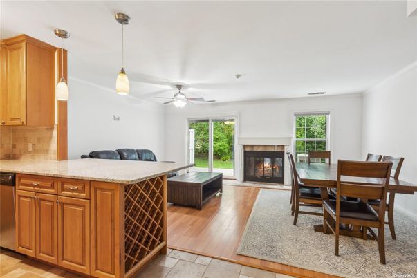 Dining room, Fireplace, Interior, Kitchen, Pendant Lights, Wood Texture Flooring