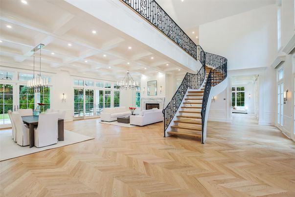 Chandelier, Dining room, Fireplace, Interior, Living room, Pendant Lights, Recessed Lighting, Wood Texture Flooring