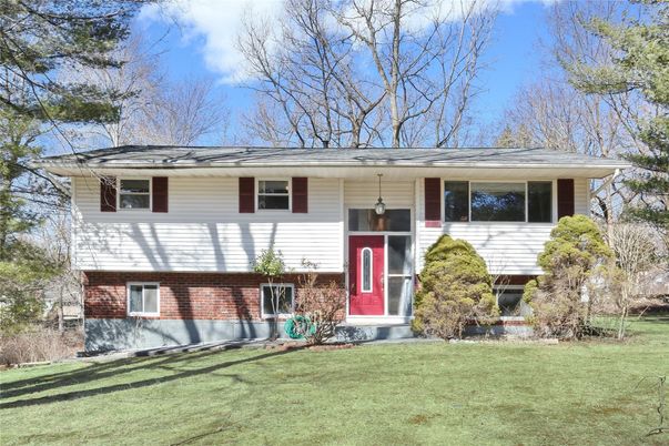 Exterior, Facade, Brick Facade, Raised Ranch