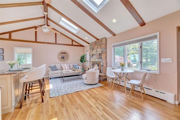 Fireplace, Interior, Living room, Recessed Lighting, Stone Walls, Wooden Beams, Wood Texture Flooring