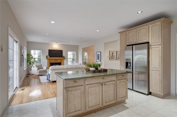 Fireplace, Interior, Kitchen, Living room, Recessed Lighting, Stainless Steel Appliances, Wood Texture Flooring