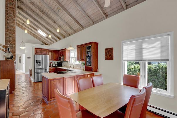 Dining room, Interior, Kitchen, Pendant Lights, Stainless Steel Appliances, Stone Walls, Wooden Ceilings