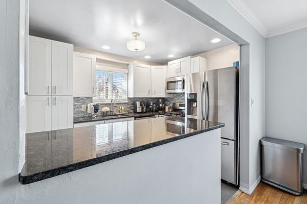 Interior, Kitchen, Recessed Lighting, Stainless Steel Appliances, Wood Texture Flooring