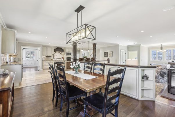 Dining room, Interior, Kitchen, Pendant Lights, Recessed Lighting, Stainless Steel Appliances, Wood Texture Flooring
