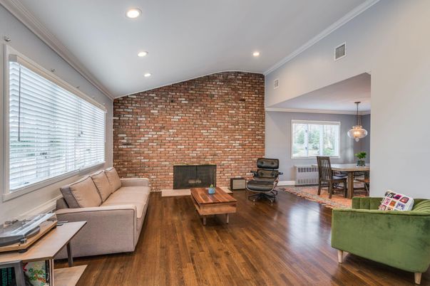 Dining room, Fireplace, Interior, Living room, Pendant Lights, Recessed Lighting, Stone Walls, Wood Texture Flooring