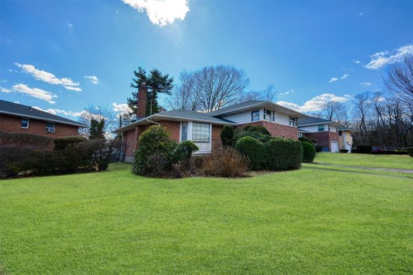Exterior, Facade, Brick Facade, Split Level