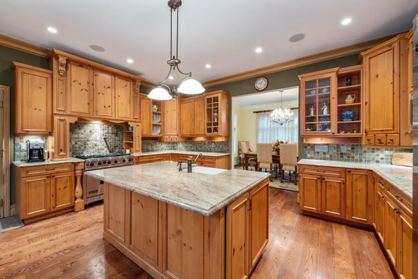 Chandelier, Dining room, Interior, Kitchen, Pendant Lights, Recessed Lighting, Stainless Steel Appliances, Wood Texture Flooring