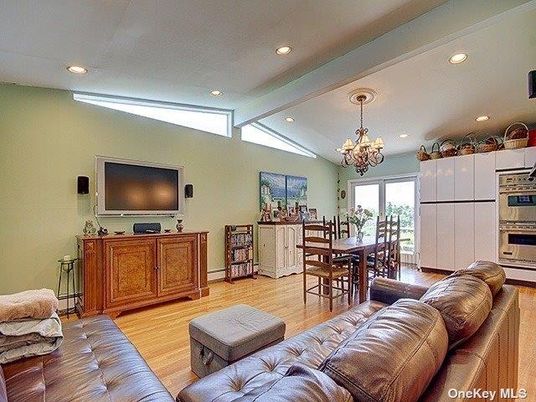 Chandelier, Dining room, Interior, Kitchen, Living room, Recessed Lighting, Stainless Steel Appliances, Wood Texture Flooring