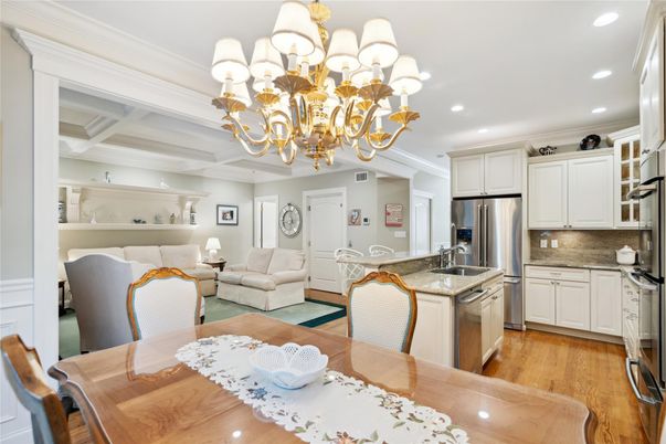 Chandelier, Dining room, Interior, Kitchen, Living room, Recessed Lighting, Stainless Steel Appliances, Wood Texture Flooring