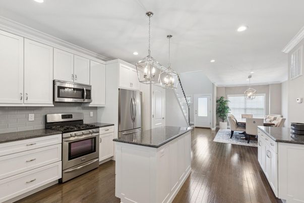 Chandelier, Dining room, Interior, Kitchen, Pendant Lights, Recessed Lighting, Stainless Steel Appliances, Wood Texture Flooring