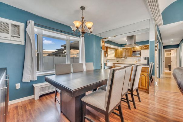 Chandelier, Dining room, Interior, Kitchen, Recessed Lighting, Stainless Steel Appliances, Wood Texture Flooring