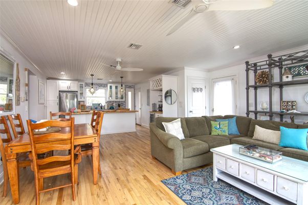Dining room, Interior, Kitchen, Living room, Recessed Lighting, Stainless Steel Appliances, Wood Texture Flooring