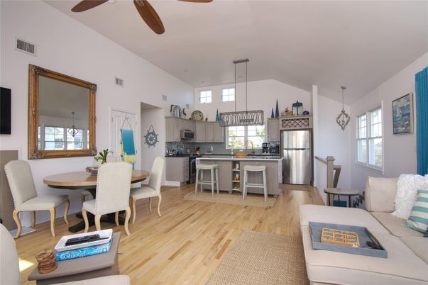 Dining room, Interior, Kitchen, Pendant Lights, Stainless Steel Appliances, Wood Texture Flooring