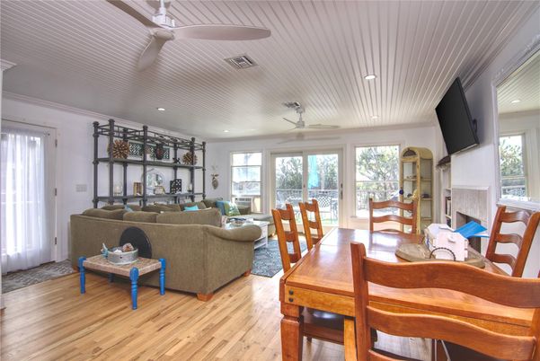 Dining room, Fireplace, Interior, Living room, Recessed Lighting, Wood Texture Flooring