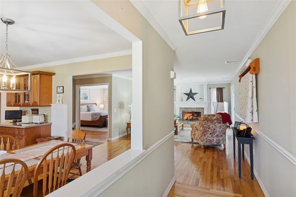 Bedroom, Dining room, Fireplace, Interior, Pendant Lights, Wood Texture Flooring