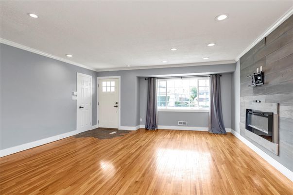 Empty room, Fireplace, Interior, Recessed Lighting, Wood Texture Flooring