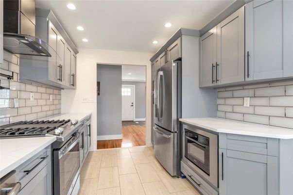 Interior, Kitchen, Recessed Lighting, Stainless Steel Appliances, Wood Texture Flooring