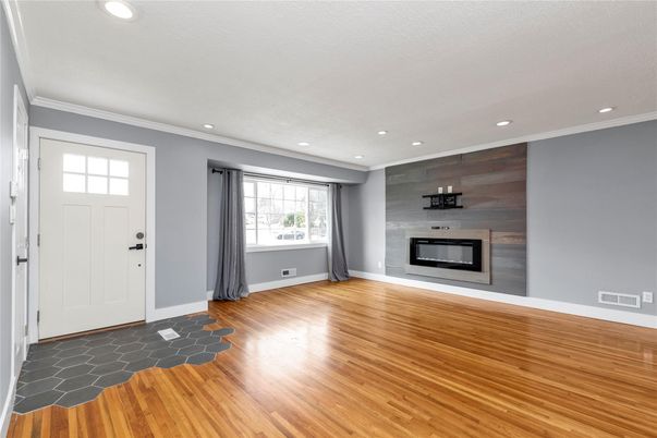 Empty room, Fireplace, Interior, Recessed Lighting, Wood Texture Flooring, Wooden Walls
