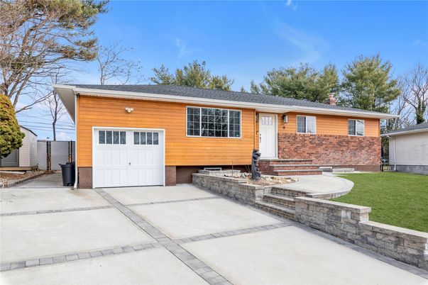 Attached, Exterior, Facade, Brick Facade, Raised Ranch