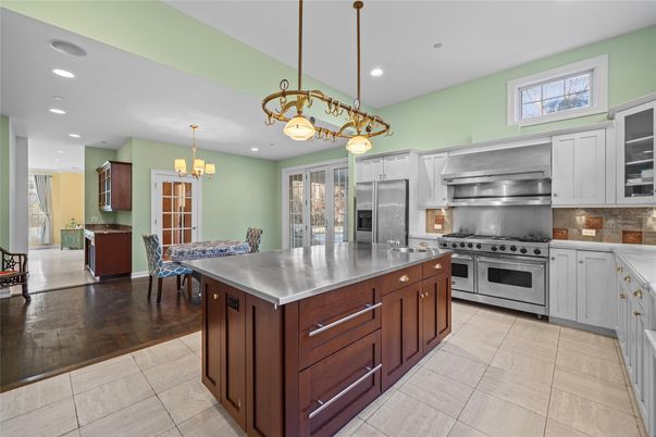 Chandelier, Dining room, Interior, Kitchen, Pendant Lights, Recessed Lighting, Stainless Steel Appliances, Wood Texture Flooring