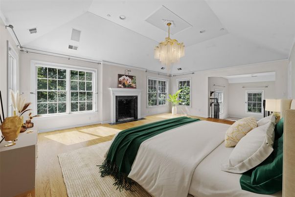Bedroom, Chandelier, Fireplace, Interior, Recessed Lighting, Wood Texture Flooring