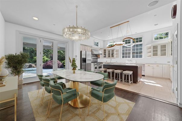 Chandelier, Dining room, Interior, Kitchen, Pendant Lights, Recessed Lighting, Stainless Steel Appliances, Wood Texture Flooring