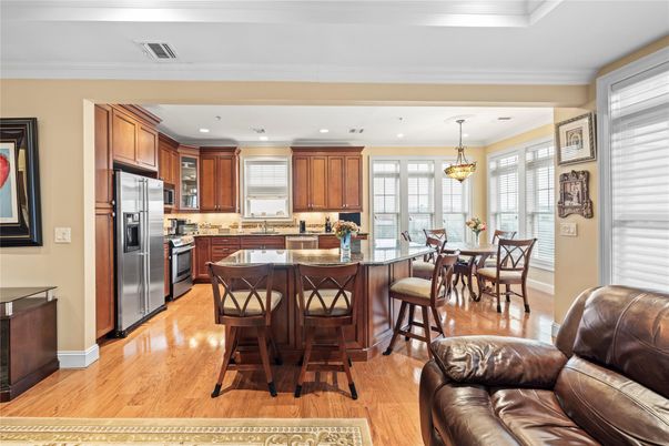 Dining room, Interior, Kitchen, Pendant Lights, Recessed Lighting, Stainless Steel Appliances, Wood Texture Flooring