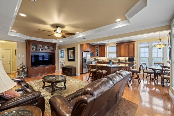 Chandelier, Dining room, Interior, Kitchen, Living room, Recessed Lighting, Stainless Steel Appliances, Wood Texture Flooring